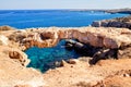 Natural bridge in Cavo Cape Greco, at National Forest Park Royalty Free Stock Photo