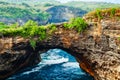 Natural bridge over sea pool Broken Bay in Nusa Penida