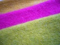 Natural bright knitted fabric of different colors. Bright sweaters, cashmere fabrics, wool. Royalty Free Stock Photo