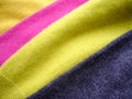 Natural bright knitted fabric of different colors. Bright sweaters, cashmere fabrics, wool. Royalty Free Stock Photo