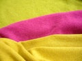 Natural bright knitted fabric of different colors. Bright sweaters, cashmere fabrics, wool. Royalty Free Stock Photo