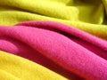 Natural bright knitted fabric of different colors. Bright sweaters, cashmere fabrics, wool. Royalty Free Stock Photo