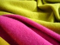 Natural bright knitted fabric of different colors. Bright sweaters, cashmere fabrics, wool. Royalty Free Stock Photo