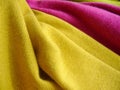 Natural bright knitted fabric of different colors. Bright sweaters, cashmere fabrics, wool. Royalty Free Stock Photo