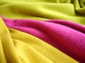 Natural bright knitted fabric of different colors. Bright sweaters, cashmere fabrics, wool. Royalty Free Stock Photo