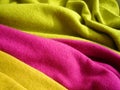 Natural bright knitted fabric of different colors. Bright sweaters, cashmere fabrics, wool. Royalty Free Stock Photo