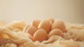 Natural brown eggs on soft fabric with warm lighting for easter or rustic kitchen decor Royalty Free Stock Photo