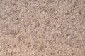 Natural brown granite surface texture, background. Royalty Free Stock Photo