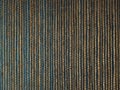 Natural brown grass weave on a teal background, wallpaper texture