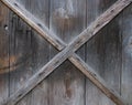 Natural brown and grey vintage aged crossed wood plank wall