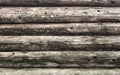 Natural brown log cabin wood wall. Wall texture background pattern.