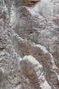 Natural brown-white stone background of part of rock formation .