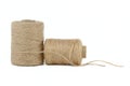 Natural burlap threads or jute twine rolls over white Royalty Free Stock Photo