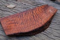 Burma padauk wood has tiger stripe or curly stripe grain on the table
