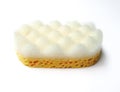 Aerial view of Vegetal massage sponge with friction surface for exfoliating action isolated on white background. Natural care.