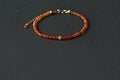 Natural Carnelian thin bracelet. Bracelet made of stones on hand from natural stone Carnelian. Bracelet made of natural stones.