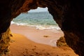 Natural cave in the Algarve on the beach at Praia da Coelha, Albufeira, Portugal Royalty Free Stock Photo