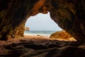 Natural cave in the Algarve on the beach at Praia da Coelha, Albufeira, Portugal Royalty Free Stock Photo