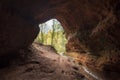 Natural cave in the park at the Rozhdestveno estate, near the town of Gatchina