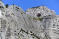 The natural caves for monks in the rock formations of Meteora were then formed by weathering by water, wind, and extremes of Royalty Free Stock Photo