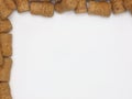 Natural Champagne or Sparkling Wine Corks Framing a White Background Royalty Free Stock Photo