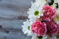 Natural chrysanthemums and carnations from Bulgaria arranged in a simple bouquet