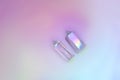 Natural clear crystal quartz electroplating rainbow on holographic background. Meditation, reiki and spiritual healing concept Royalty Free Stock Photo