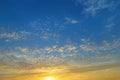 Natural Clouds formation on a blue sky in the evening with yellow