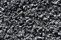 Natural coal deposits. Texture and background. Fine fraction. Royalty Free Stock Photo