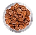 Natural coffee beans heap in glass bowl