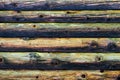 Natural colorful weathered log cabin wood wall. Wooden background pattern. Royalty Free Stock Photo