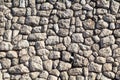 Natural contrast masonry wall stone granite is a pattern of texture, material and background with colored stones. Royalty Free Stock Photo