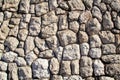 Natural contrast masonry wall stone granite is a pattern of texture, material and background with colored stones. Royalty Free Stock Photo