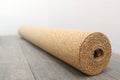 Natural cork substrate on the floor with laminate Royalty Free Stock Photo