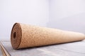 Natural cork substrate on the floor with laminate Royalty Free Stock Photo