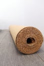Natural cork substrate on the floor with laminate Royalty Free Stock Photo