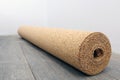 Natural cork substrate on the floor with laminate Royalty Free Stock Photo