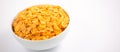 Natural corn flake breakfast cereal in cups and milk is a healthy breakfast that is good for your body every day on a white Royalty Free Stock Photo