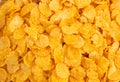 Natural corn flake breakfast cereal in cups and milk is a healthy breakfast that is good for your body every day on a white Royalty Free Stock Photo