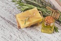 Natural cosmetic oil and natural handmade soap with rosemary on Royalty Free Stock Photo