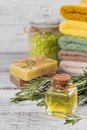 Natural cosmetic oil and natural handmade soap with rosemary on Royalty Free Stock Photo