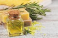 Natural cosmetic oil and natural handmade soap with rosemary on Royalty Free Stock Photo