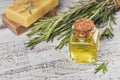 Natural cosmetic oil and natural handmade soap with rosemary on Royalty Free Stock Photo