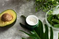 Natural cosmetics with herbal ingredients. Moisturizing cream next to natural ingredients for cosmetics. Face and skin