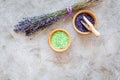 Natural cosmetics with lavender and herbs for homemade spa on stone background top view mock up Royalty Free Stock Photo