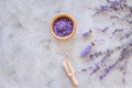 Natural cosmetics with lavender and herbs for homemade spa on stone background top view mock up Royalty Free Stock Photo