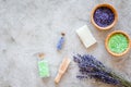 Natural cosmetics with lavender and herbs for homemade spa on stone background top view mock up Royalty Free Stock Photo