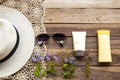 Natural cosmetics for skin face sunscreen spf50 ,body lotion ,sunglasses ,crochet and hat of lifestyle woman