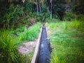 Natural Countryside Environment With Small Water Stream Channel Among The Meadows Royalty Free Stock Photo