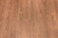 Natural dark brown wooden surface floor texture background.  polished  laminate  parquet Royalty Free Stock Photo